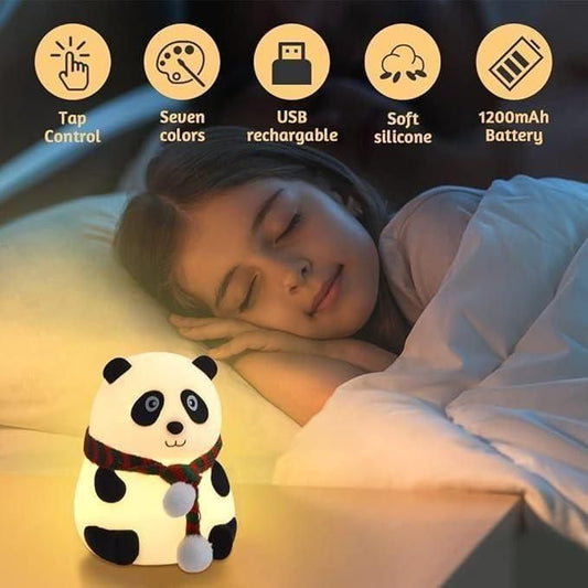 Panda-shaped night light on a bed with a child, featuring features like tap control, seven colors, USB rechargeable, soft silicone, and 1200mAh battery.